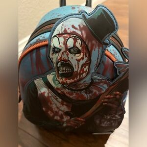 Loungefly Terrifier Art the Clown Blood Splatter Glow-in-the-Dark Mini-Backpack